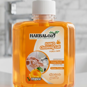 Harbalon Hand Cleaning Gel orange flavor clear pump bottle on kitchen counter